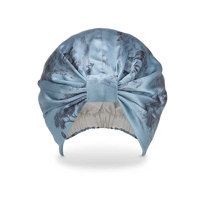 Blue silk hair wrap with black traditional artistic design