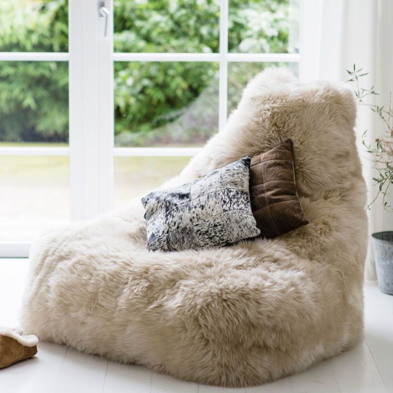 A sumptuously soft and snuggly bean bag chair made from New Zealand Sheepskin