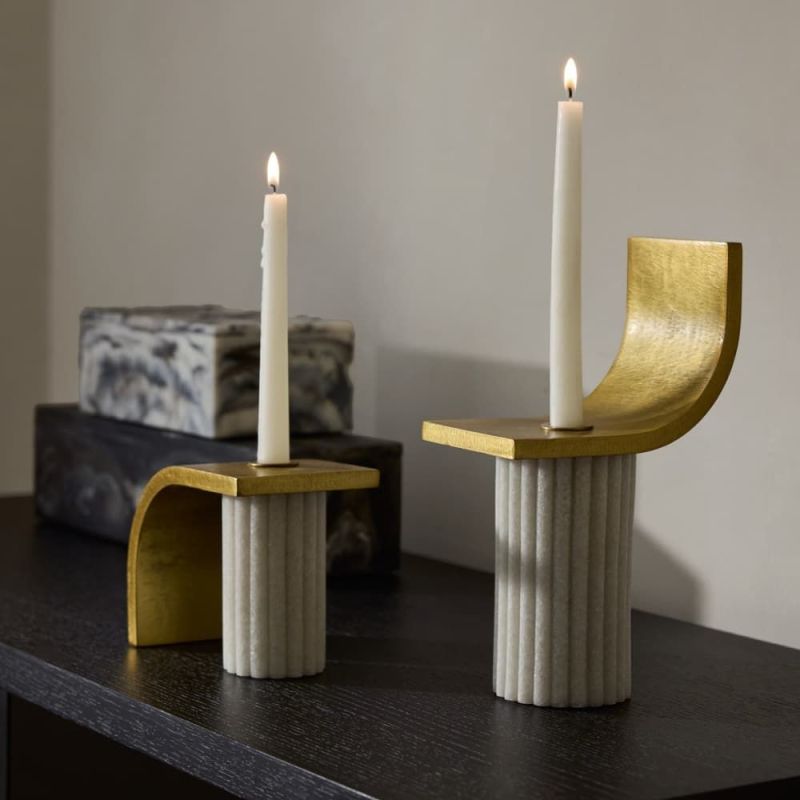 Illuminate your space with the Ivanna Candleholders Set of 2. Elegantly crafted to enhance any décor, perfect for adding warmth and style.