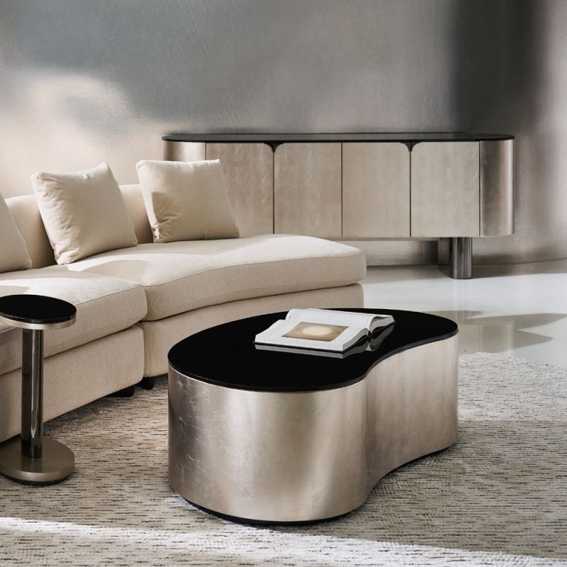 Elevate your space with the Adele Coffee Table by Caracole. Its elegant design and premium materials blend style and functionality seamlessly.