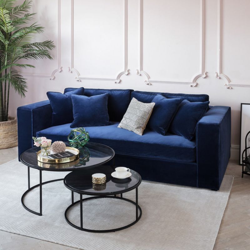 contemporary royal blue upholstered sofa with wide arms