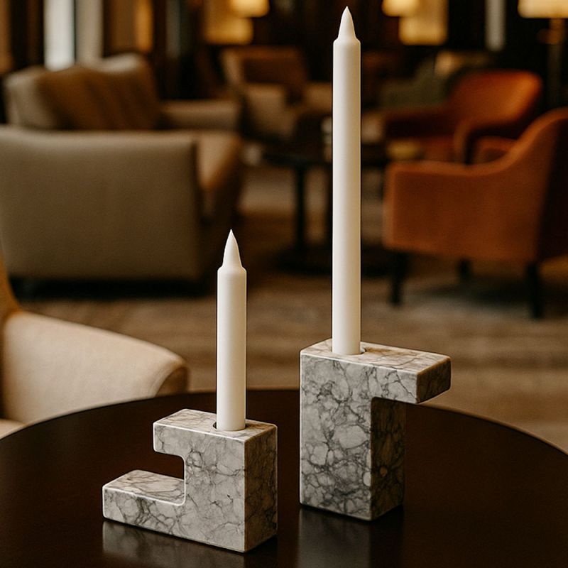 Elevate your décor with the Arco Candle Holders Set. Stylish and modern, these holders add warmth and elegance to any space. Perfect for any occasion!