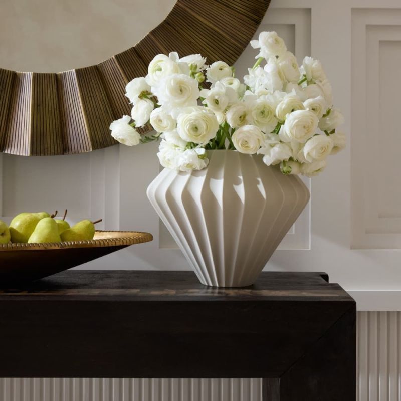 Elevate your decor with the Kaliana Vase, a stunning blend of elegance and artistry. Perfect for flowers or as a statement piece in any room.