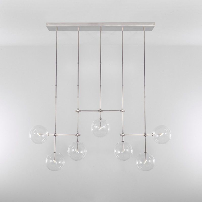 Polished nickel industrial style chandelier with hanging clear glass globe fixture