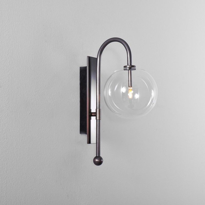 Black gunmetal brass modern industrial wall lamp with large clear glass globe