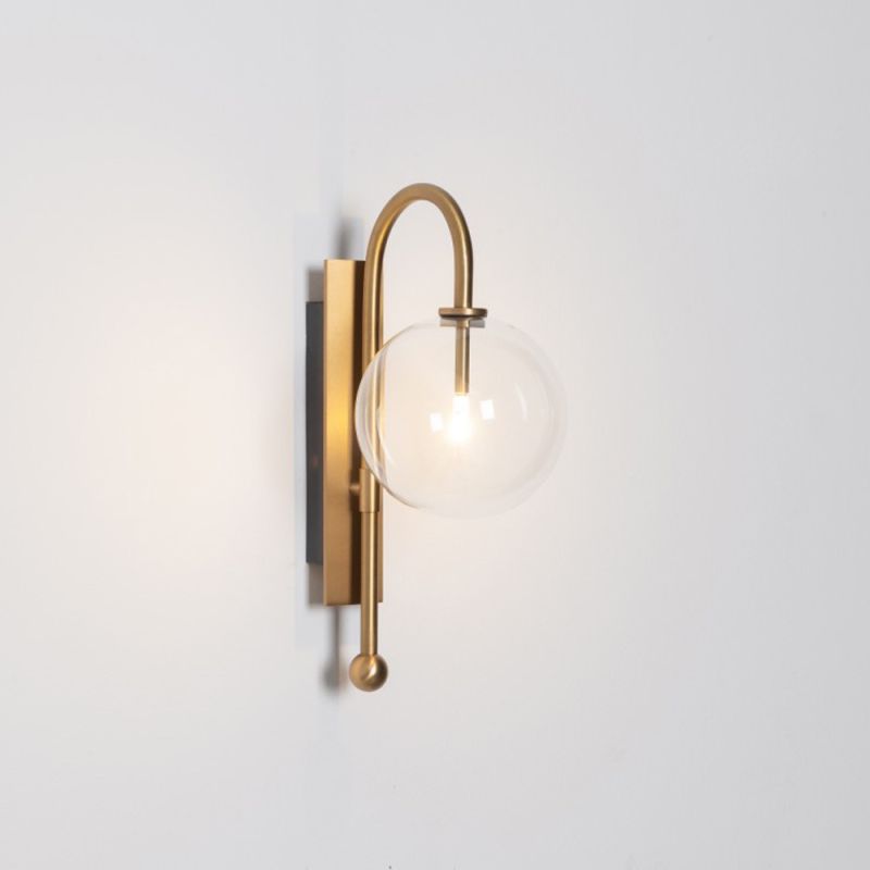 Natural solid brass industrial wall lamp with large handblown glass globe