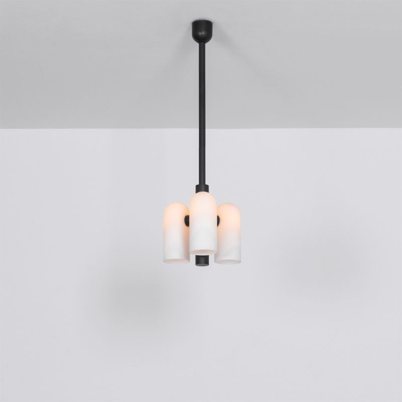 Contemporary retro style pendant ceiling light in a black gunmetal brass finish with translucent glass lampshade design