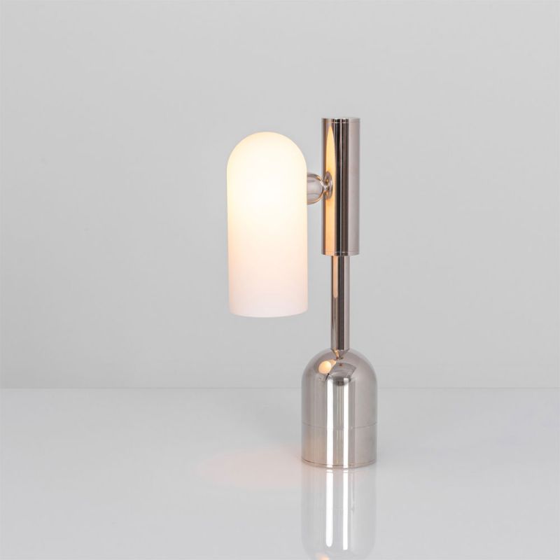 A dazzling polished nickel table lamp with triplex opal glass