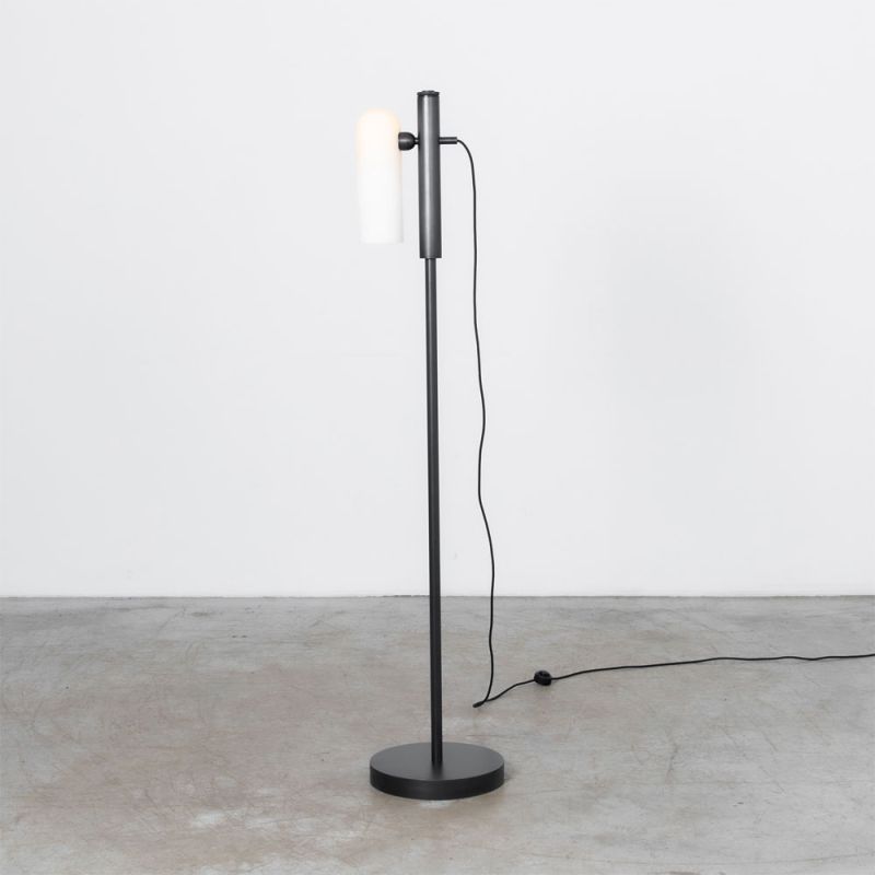 A glamorous industrial black gunmetal floor lamp with a triplex opal lampshade