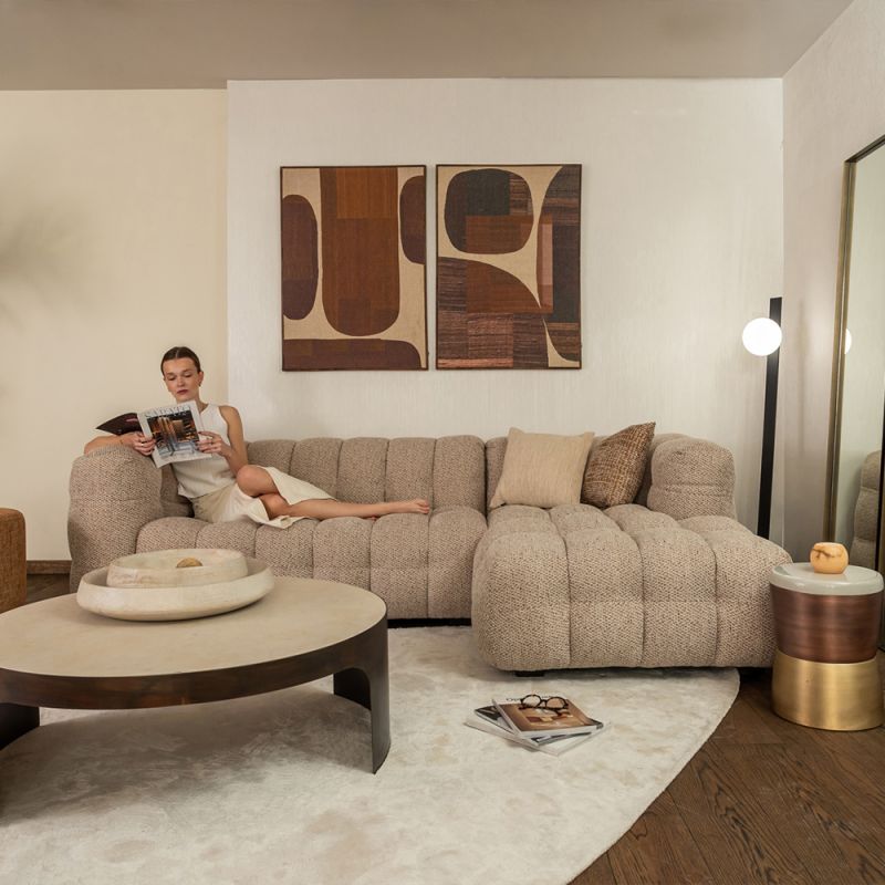 Right facing quilted taupe corner sofa