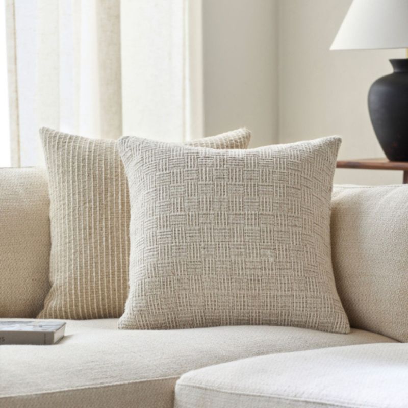 Add comfort and style to your space with the Bentonville Woven Cushion—perfect for any decor, featuring a unique design and soft texture.