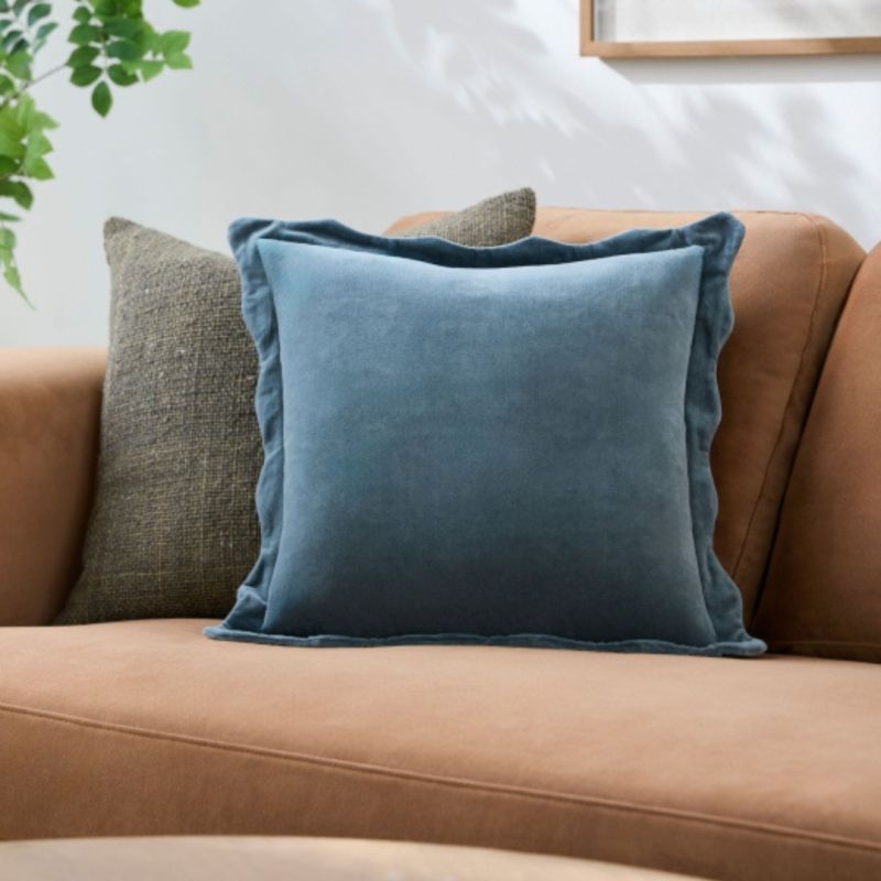 Experience ultimate comfort with our Effervescent Woven Cushion in Dusky Indigo. Perfect for adding a touch of style to any space!