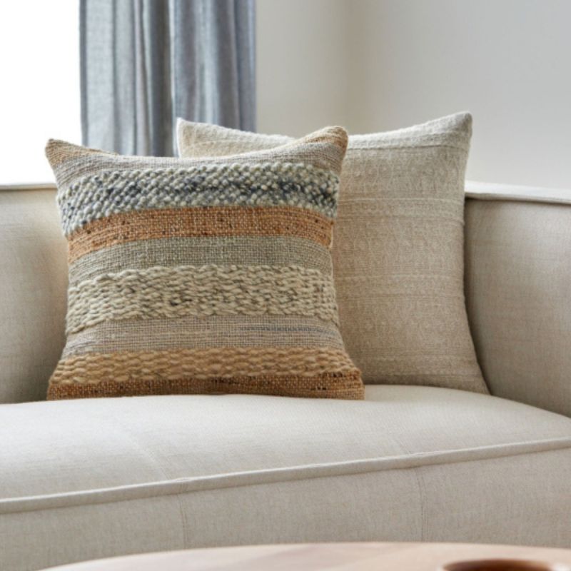 Enhance your space with the Boundary Woven Cushion in Soft Grey. Luxuriously soft and stylish, it's perfect for adding comfort to any decor.