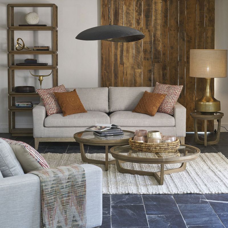 A luxurious modern cosy sofa with beige upholstery  