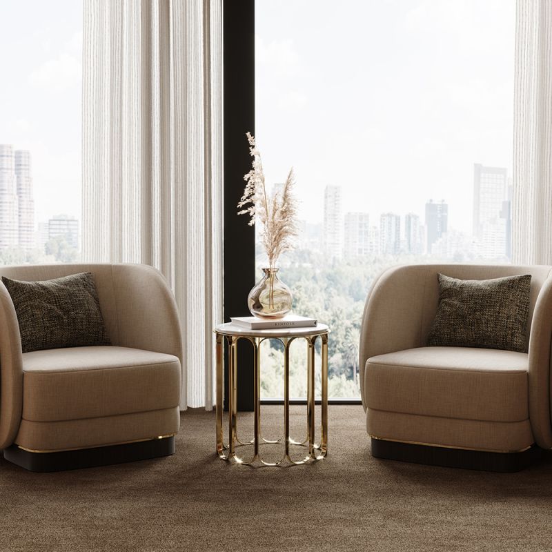 A luxurious modern side table with a golden base and marble tabletop