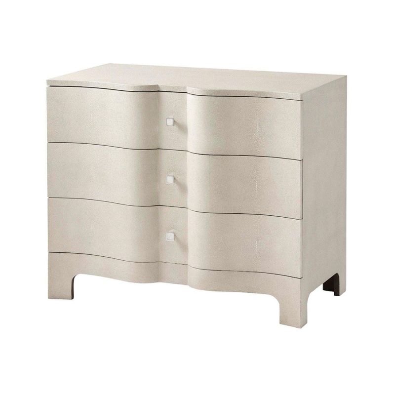 A luxurious chest of drawers with an undulating design, shagreen-embossed leather wrapping and nickel details  