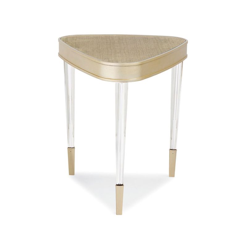 Glamorous gently triangular side table with acrylic legs and champagne gold finish