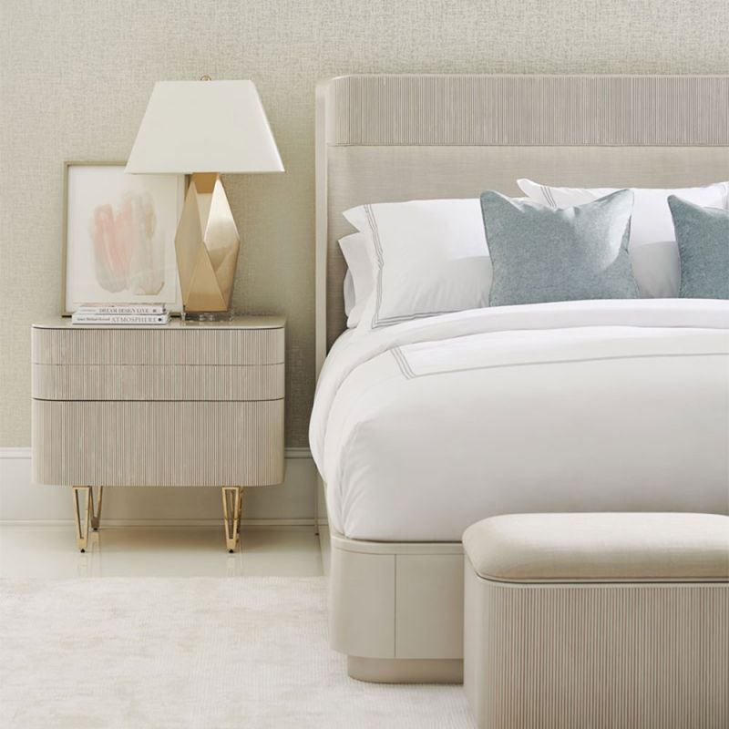 Stunningly elegant ribbed bedside table with glamorous gold feet details