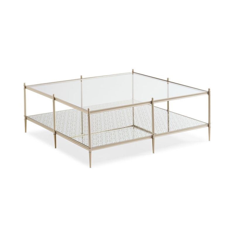 A glamorous, square coffee table by Caracole with a patterned surface