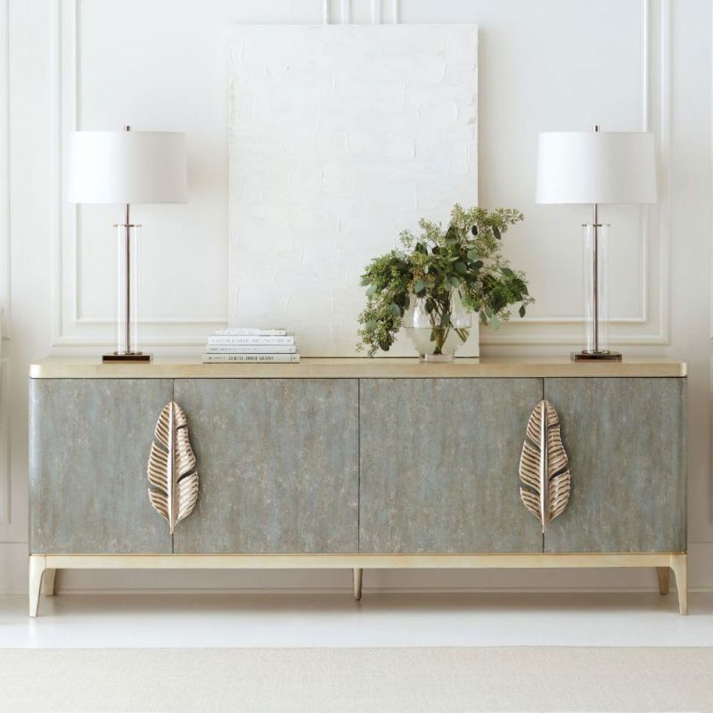 Artistic sideboard with whisper of gold details and gorgeous metal leaf design handles