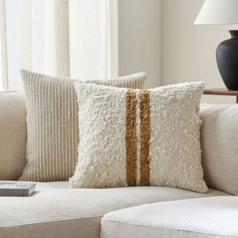 Elevate your space with the Dagny Woven Cushion. Its stylish design and cosy texture add comfort and charm to any room.