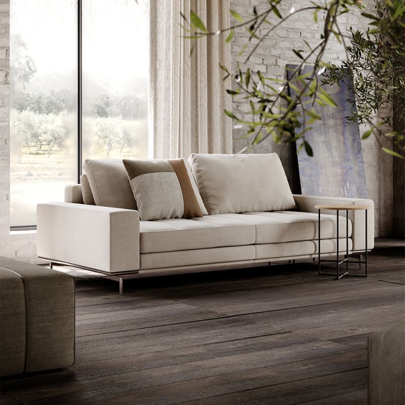 A contemporary upholstered 2 seater sofa by Domkapa with polished stainless steel legs