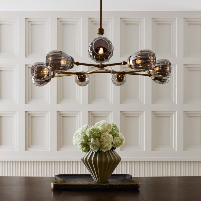 Elevate your space with the Smyth Chandelier, featuring elegant design and stunning illumination for a perfect blend of style and sophistication.