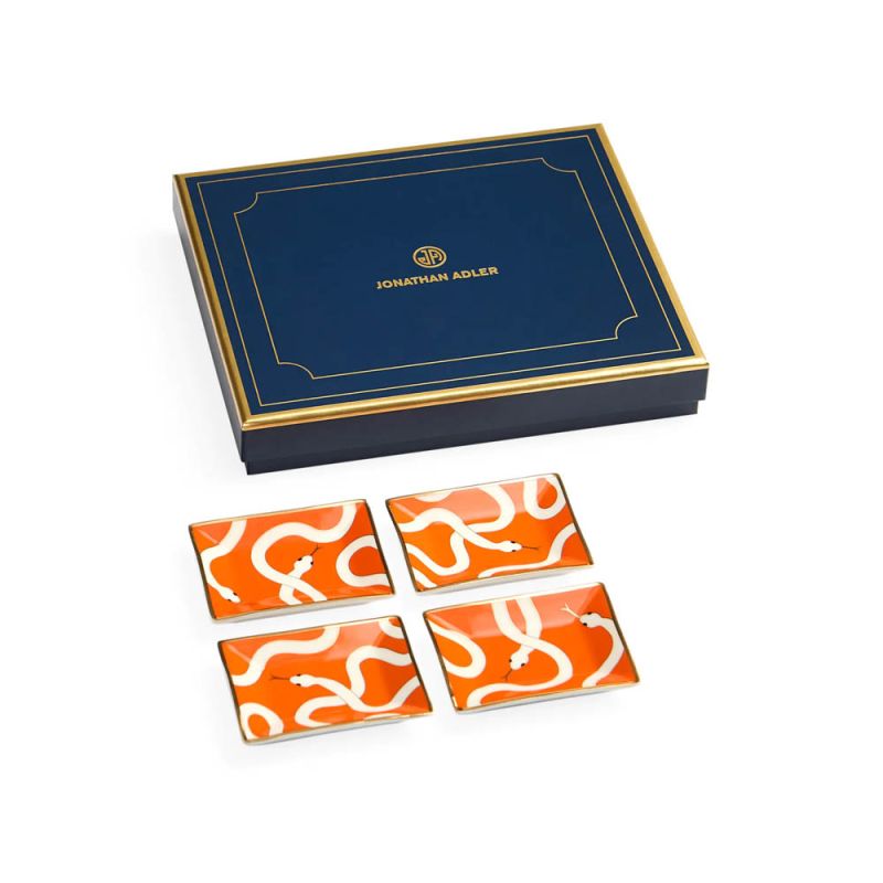 Orange set of 4 trays with white snakes