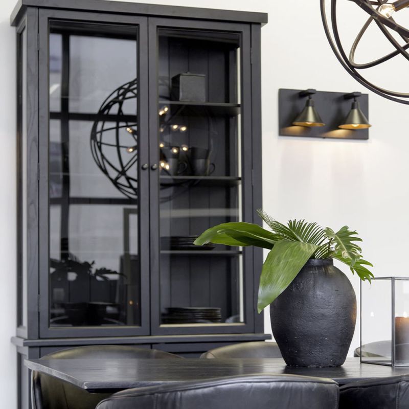 Black cabinet with two lower covered doors and upper display unit