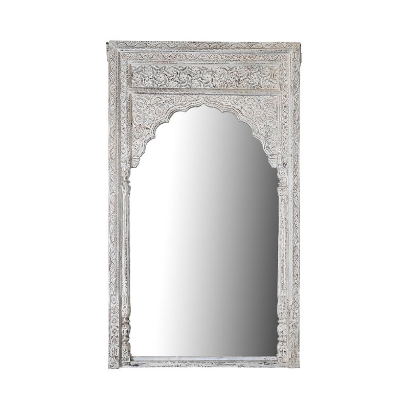 A decorative, antiqued wall mirror with an arched frame and distressed finish