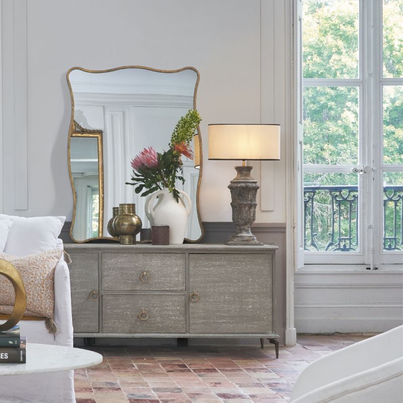 Unique Eloise mirror with curved frame in aged gold