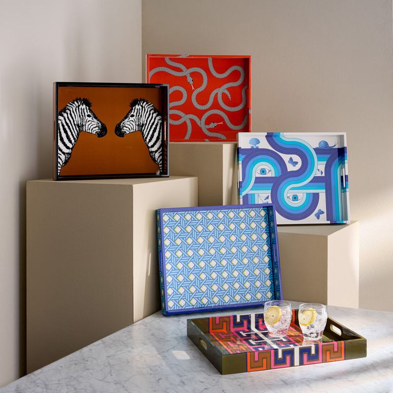 Rectangular tray with a light blue glaze and gold caning, combining preppy sophistication with modern elegance.