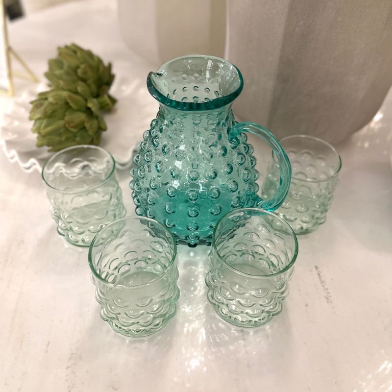 this pitcher features a unique bubble design and vibrant green colour