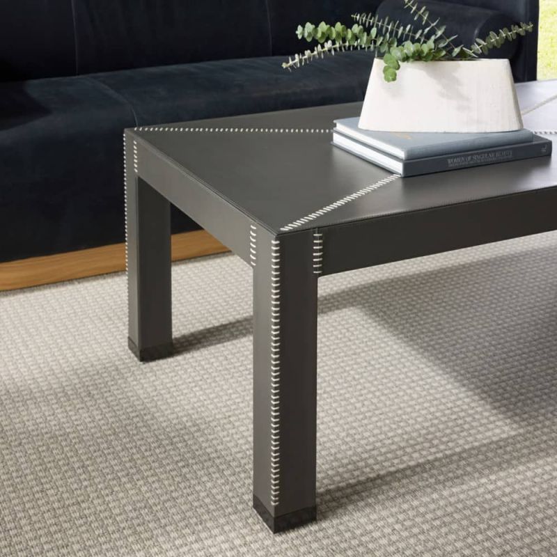 Rectangular cocktail table with simple frame and stitched leather covering