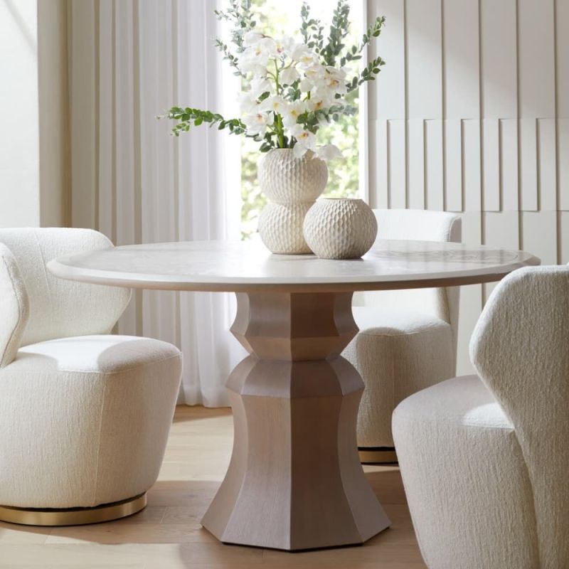 Elevate your dining experience with the Kinsley Dining Table, featuring exquisite design and durable craftsmanship for elegant meals with loved ones.