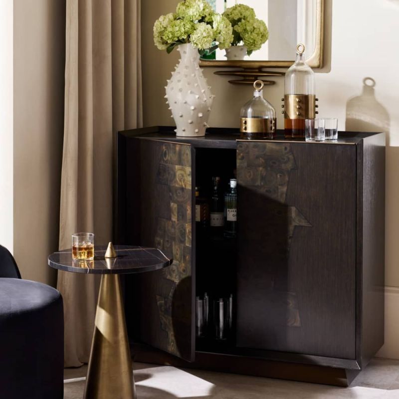 Sleek cabinet with two doors in dark antique brass finish