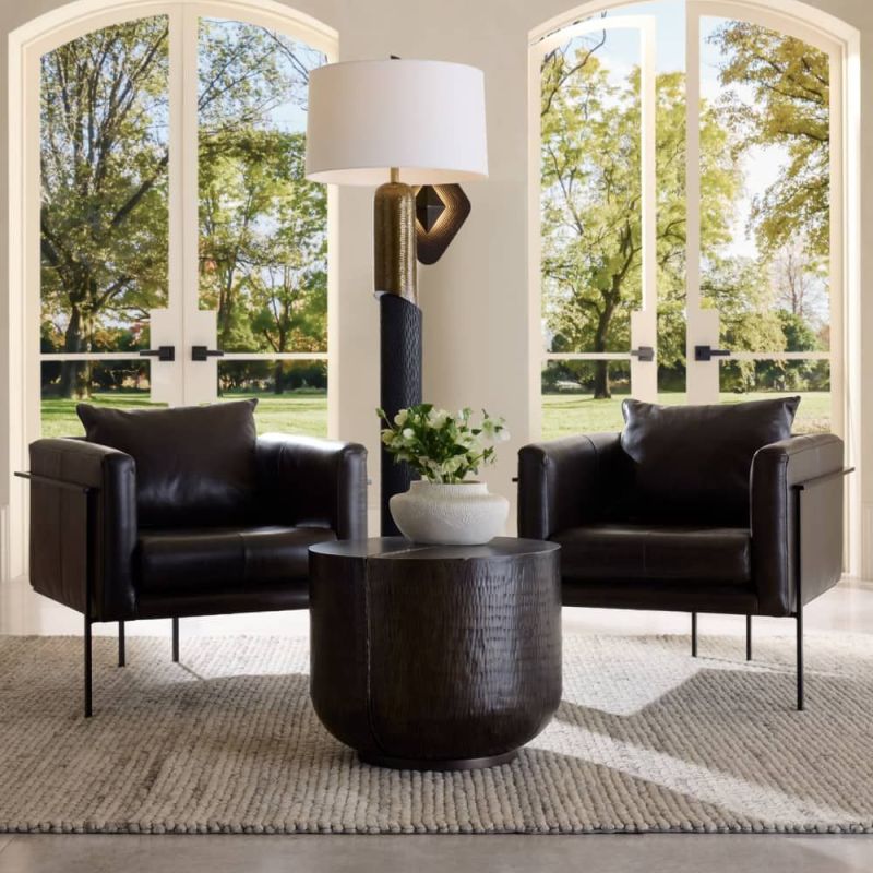 Armchair in brown leather in angular frame