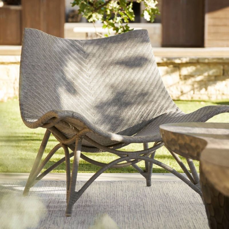 Discover the Margot Outdoor Lounge Chair, a perfect blend of style and comfort for your patio. Relax in elegance with durable materials.