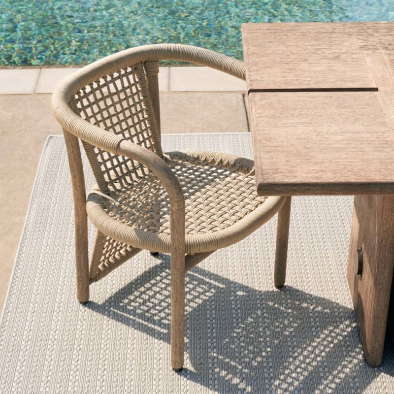 Elevate your outdoor space with the Chapman Outdoor Dining Chair. Stylish, durable, and comfortable, perfect for any patio or garden setting.