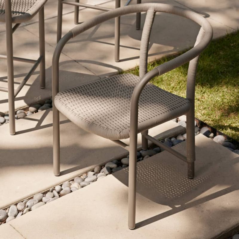 Elevate your outdoor space with the Feller Outdoor Dining Chair, featuring stylish design and durable materials for ultimate comfort and elegance.
