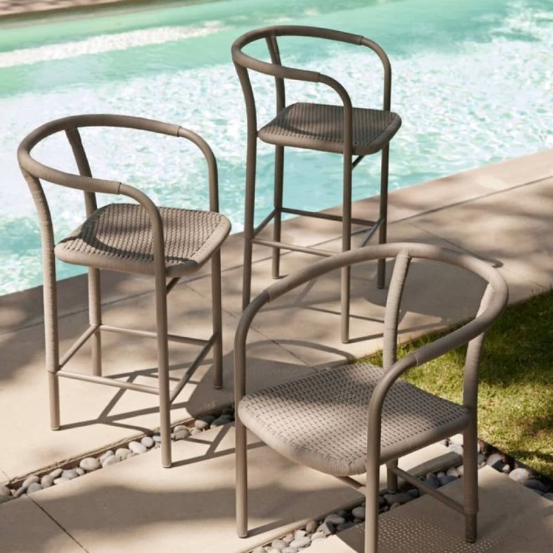 Elevate your outdoor space with the Feller Outdoor Counter Stool, combining stylish design and durable materials for comfort and elegance.