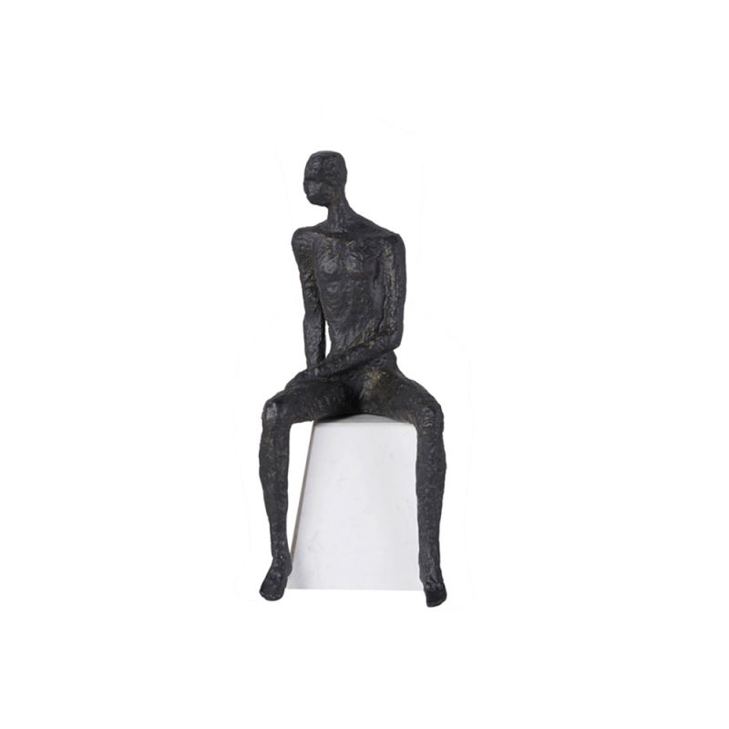 Iron figure sat on marble stand