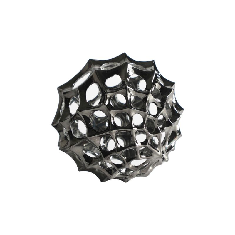 Spiked sculpture in silver with holes throughout