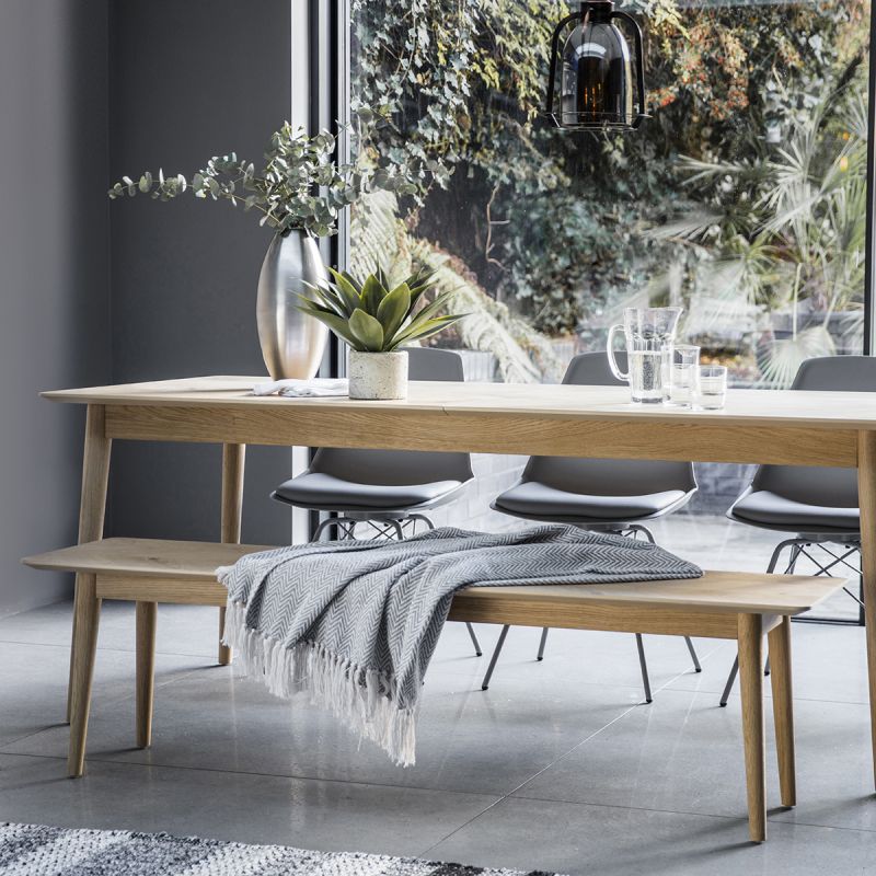 Warm wooden dining bench with chevron design