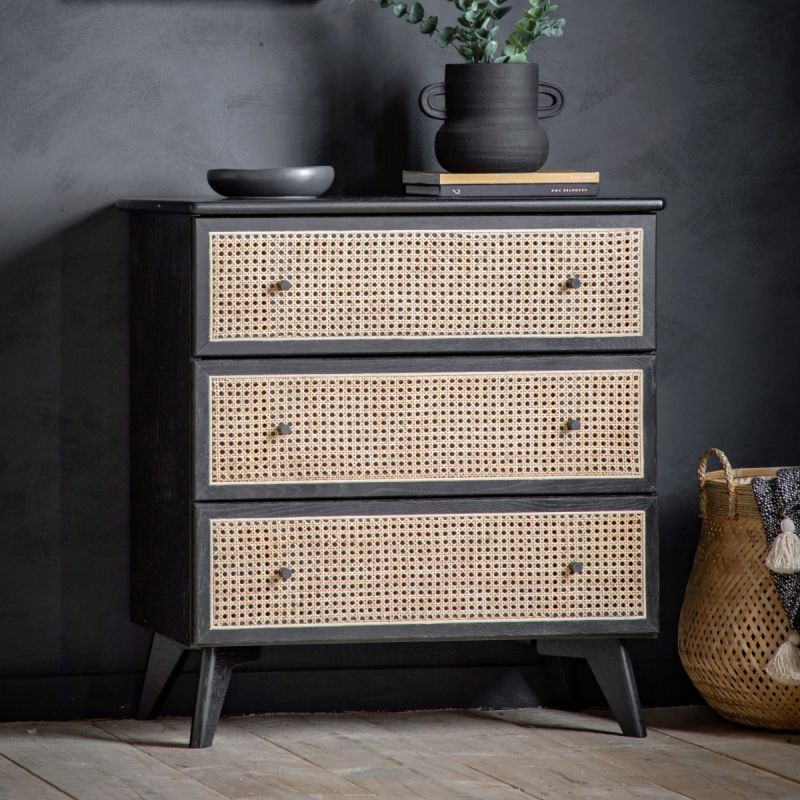 Black framed three drawer chest table with natural rattan fronted drawers