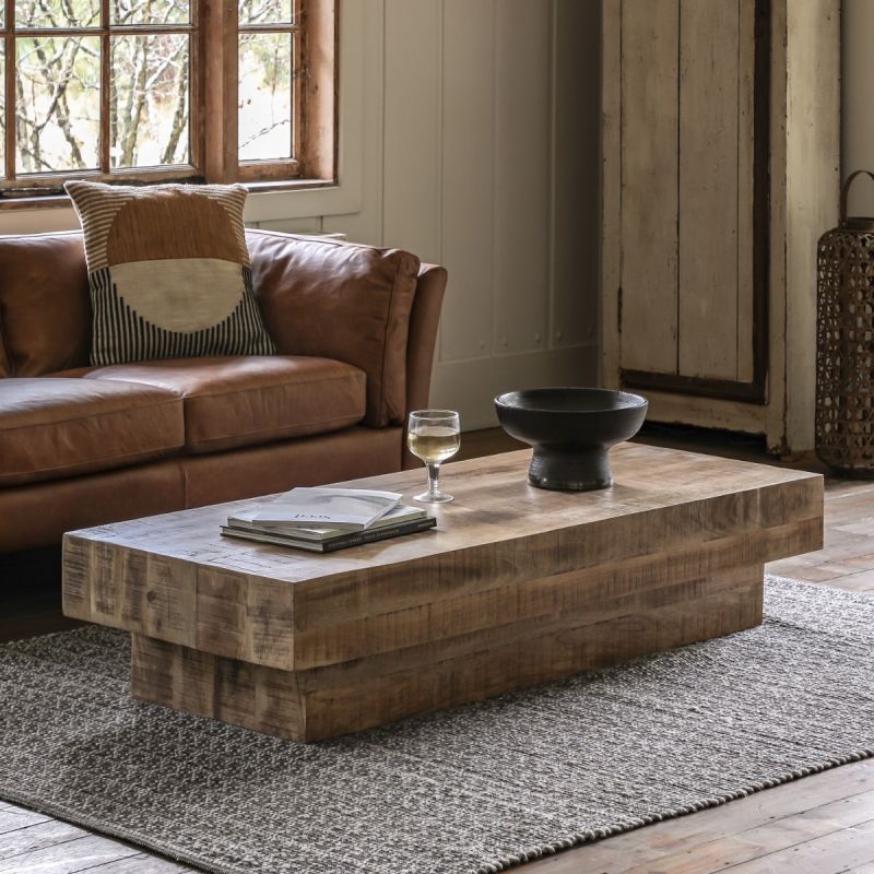 Rectangular coffee table designed to look like solid blocks of cross-sawn timber