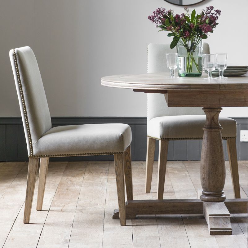 Minimalist upholstered dining chair in cream