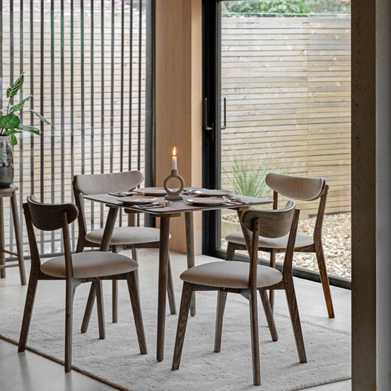 Square wooden dining table with four legs
