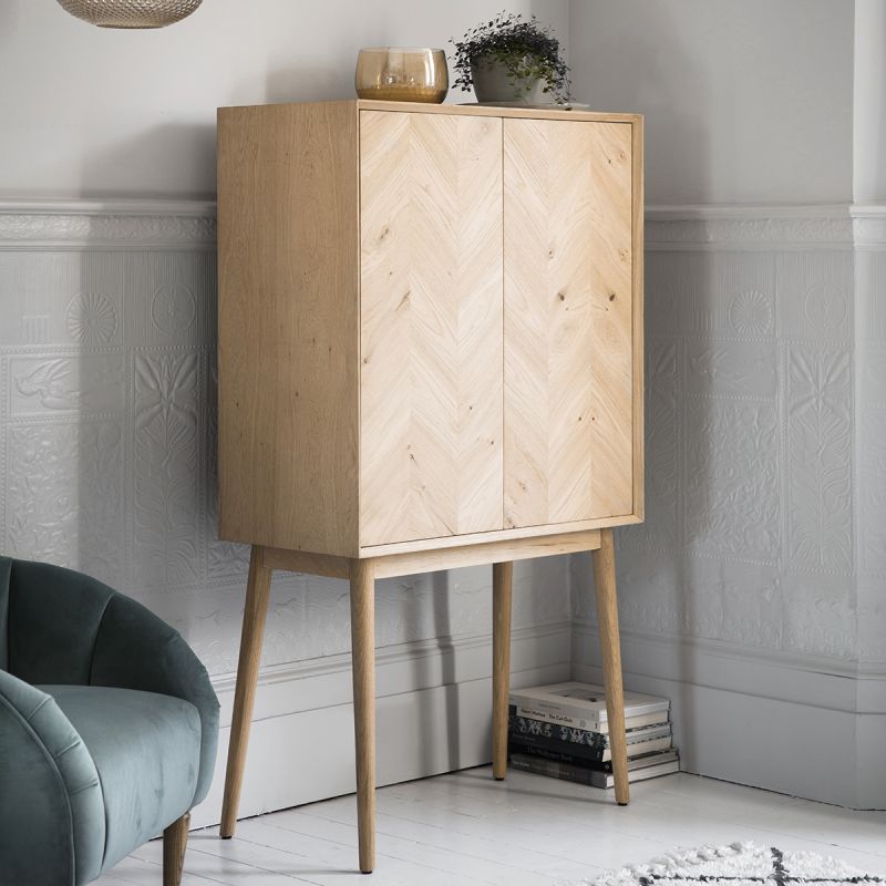 Warm wooden cocktail cabinet with chevron design