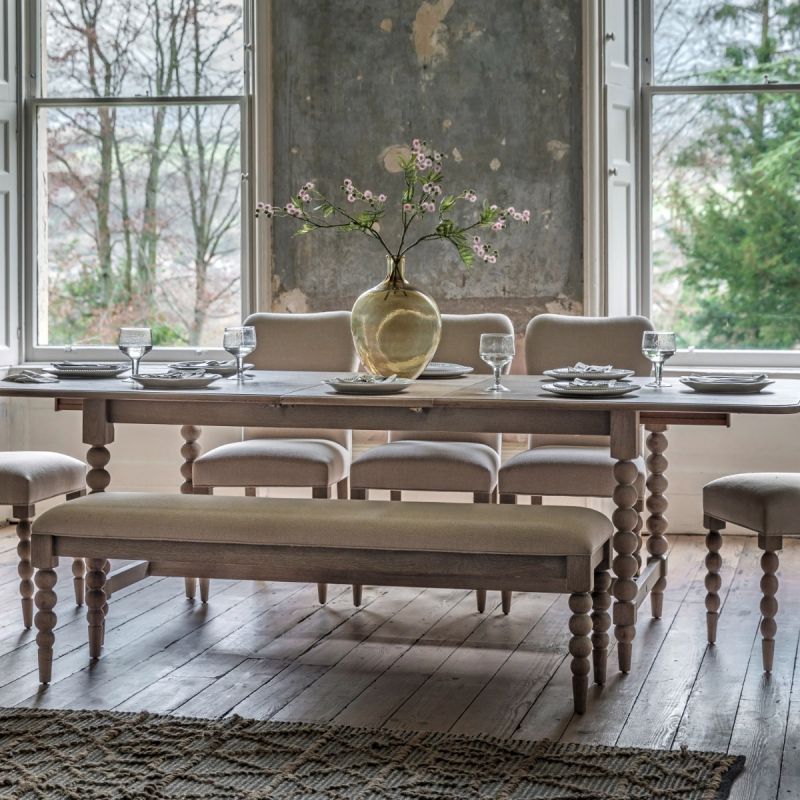 Extendable rectangular dining table with bobble effect legs